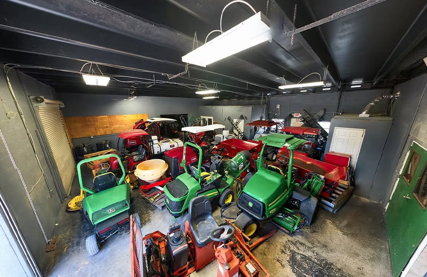 Tractors and Mowers in a warehouse