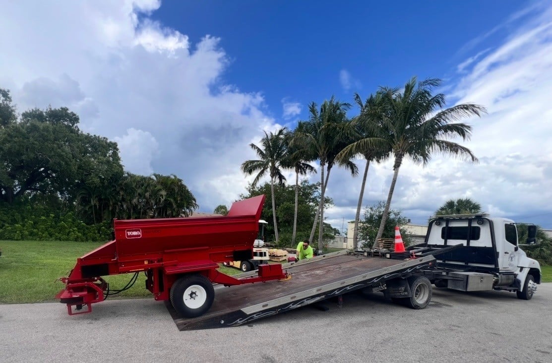 Flatbed trailer with Toro equipment