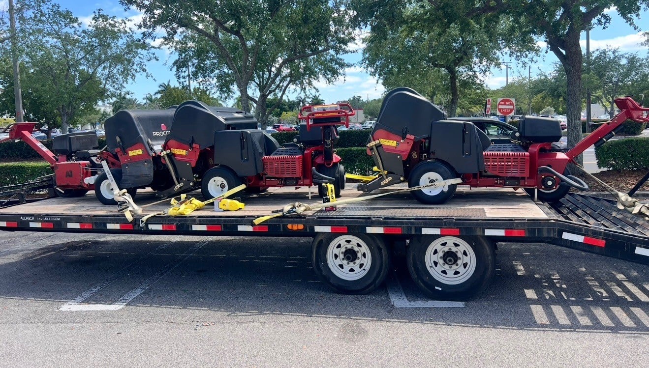 flatbed trailer with mutliple equipment